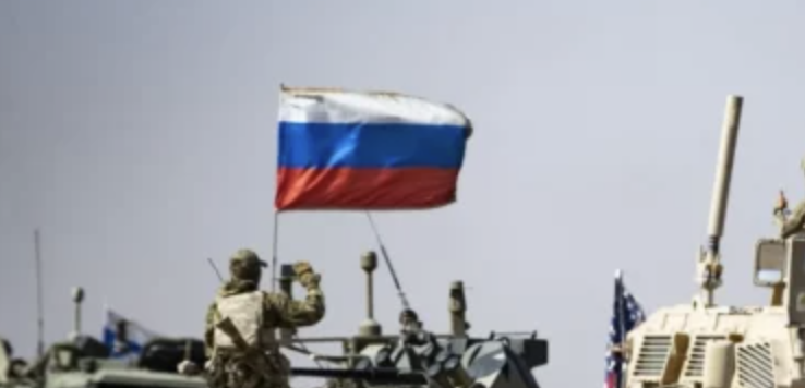 WOW: Russian Military Move Into Base Housing US Troops, Just Chilling in a Formerly American Hangar